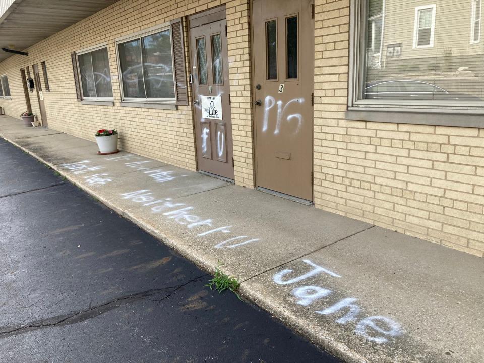 Graffiti outside of Right to Life of Northeast Ohio's Akron office reads "If abortion isn't safe, neither r u - Jane" after the building was vandalized last Friday.