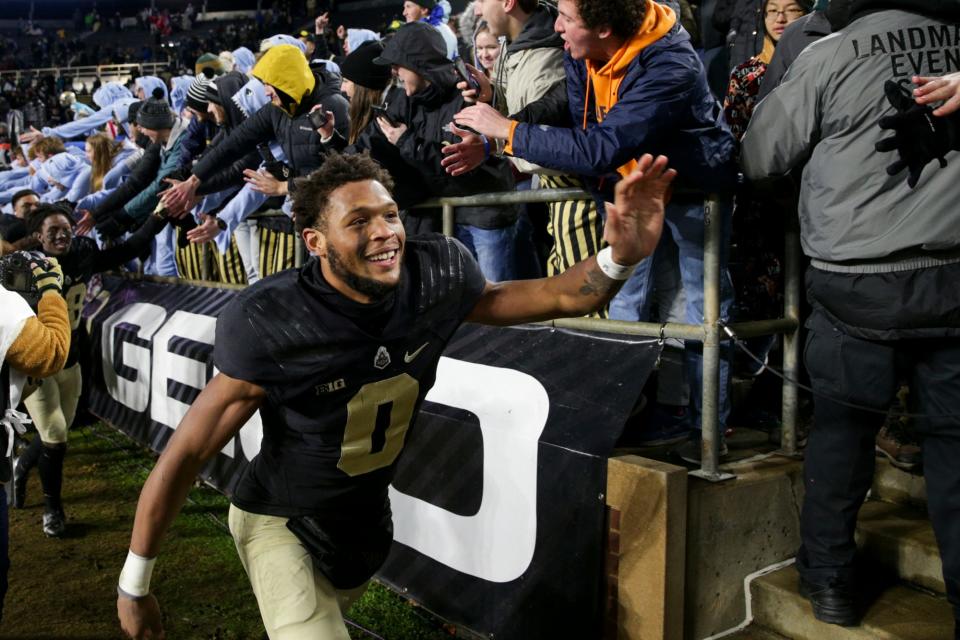 Purdue wide receiver Milton Wright (0) celebrates with fans after defeating Indiana, 44-7, Saturday, Nov. 27, 2021 at Ross-Ade Stadium in West Lafayette.