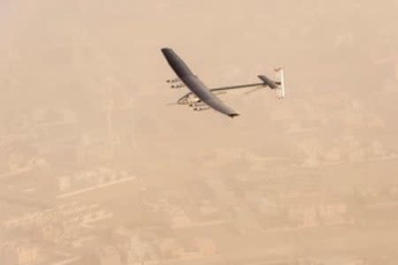 A view of the Solar Impulse 2 on flight after taking off from Al Bateen Airport in United Arab Emirates, in this handout picture provided to Reuters, courtesy of Jean Revillard, on March 9, 2015. REUTERS/Jean Revillard/Handout via Reuters