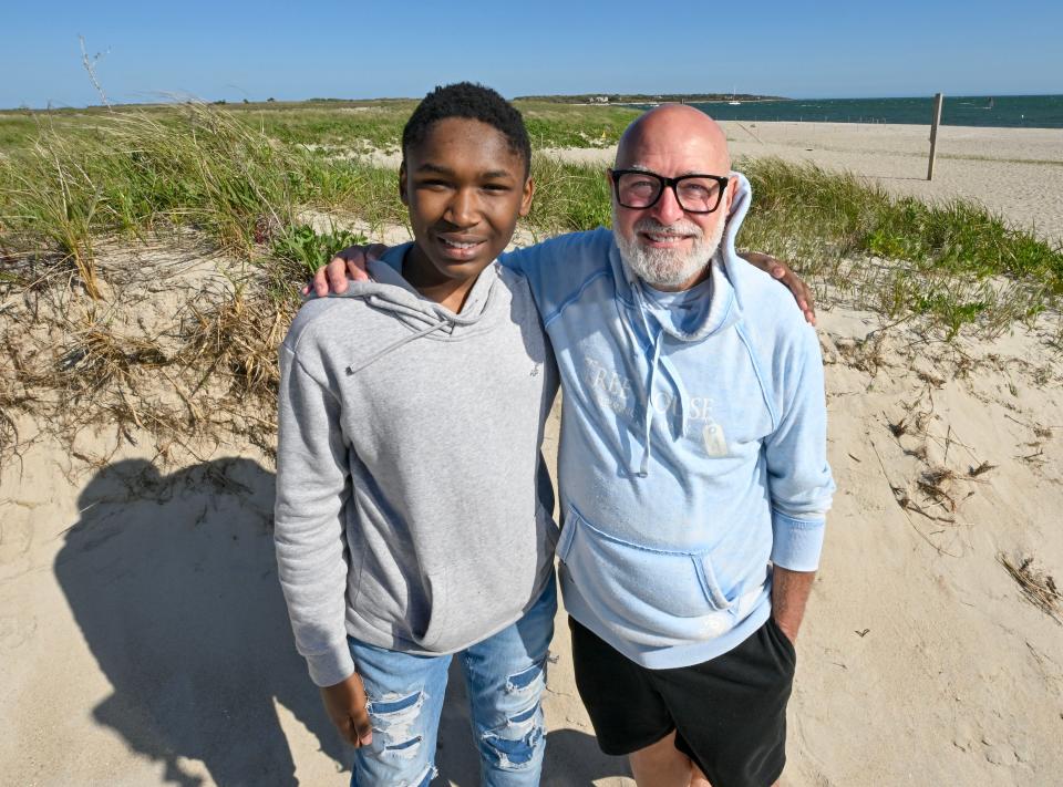 "I was scared to get on the horse. Like really, really scared. I thought I was going to fly off," said Demarcus Black, 15, speaking about   horseback riding with Big Brother Jonathan Finn. Black, left, on May 22 at Kalmus Beach in Hyannis, is a "Little Brother" to Big Brother Finn through Big Brothers Big Sisters Cape Cod and the Islands.