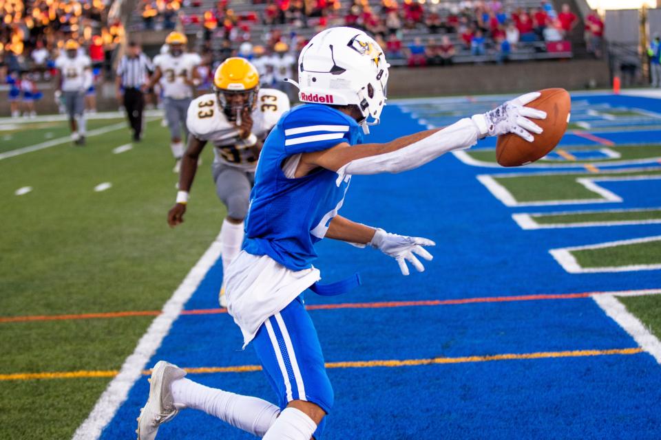 Adams’ Braylon Williams (2) scores during the Adams vs. Riley High School football game Friday, Sept. 1, 2023 at School Field in South Bend.