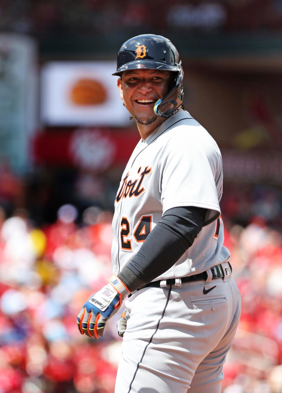 Detroit Tigers' Miguel Cabrera smiles back at first base coach Alfredo Amezaga in the sixth inning of a baseball game against the St. Louis Cardinals at Busch Stadium in St. Louis on Sunday, May 7, 2023.