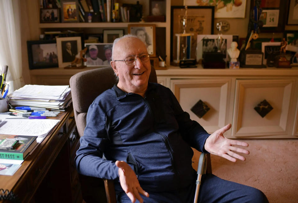 Celtics legend Bob Cousy in the office at his home in Worcester.