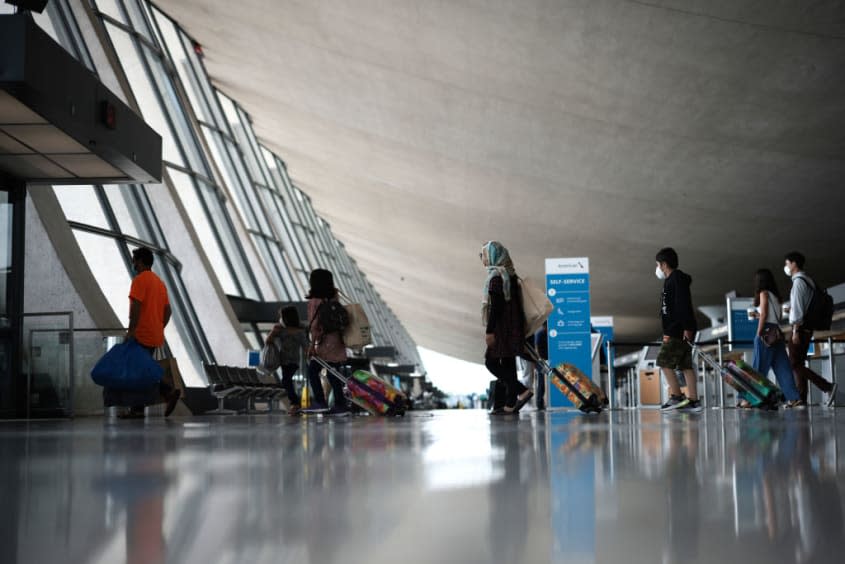 Afghan refugees at airport.