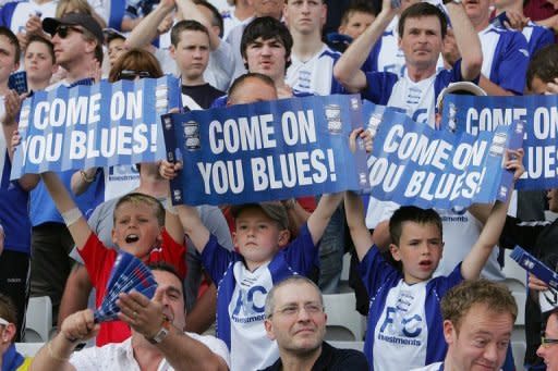 File photo of Birmingham City fans at St Andrew's stadium. Tycoon Carson Yeung, facing trial in Hong Kong on money-laundering charges, has assured Birmingham City he will continue to support the club financially despite his legal problems