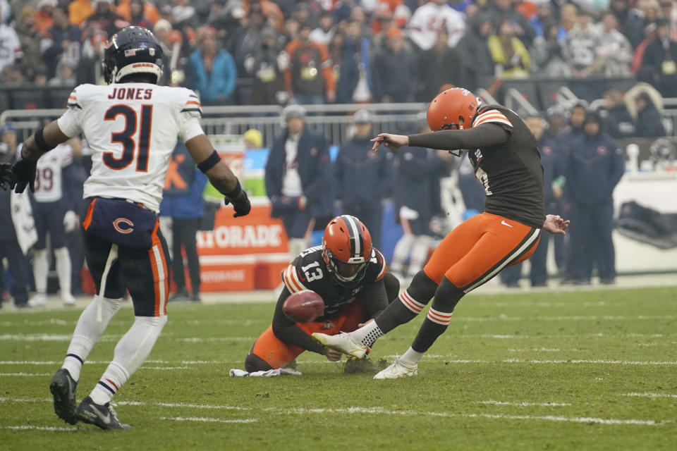 Cleveland Browns place-kicker Dustin Hopkins (7) kicks the ball in the first half of an NFL football game against the Chicago Bears in Cleveland, Sunday, Dec. 17, 2023. (AP Photo/Sue Ogrocki)