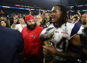 Feb 5, 2017; Houston, TX, USA; New England Patriots middle linebacker Dont'a Hightower (54) and defensive coordinator Matt Patricia celebrate with the Vince Lombardi Trophy during Super Bowl LI at NRG Stadium. Mandatory Credit: Matthew Emmons-USA TODAY Sports