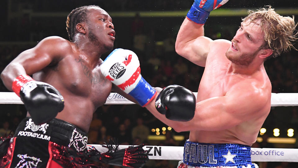 Logan Paul (red/white/blue shorts) and KSI (black/red) exchange punches their pro debut fight at Staples Center on November 9, 2019 in Los Angeles, California. KSI won by decision. (Photo by Jayne Kamin-Oncea/Getty Images)