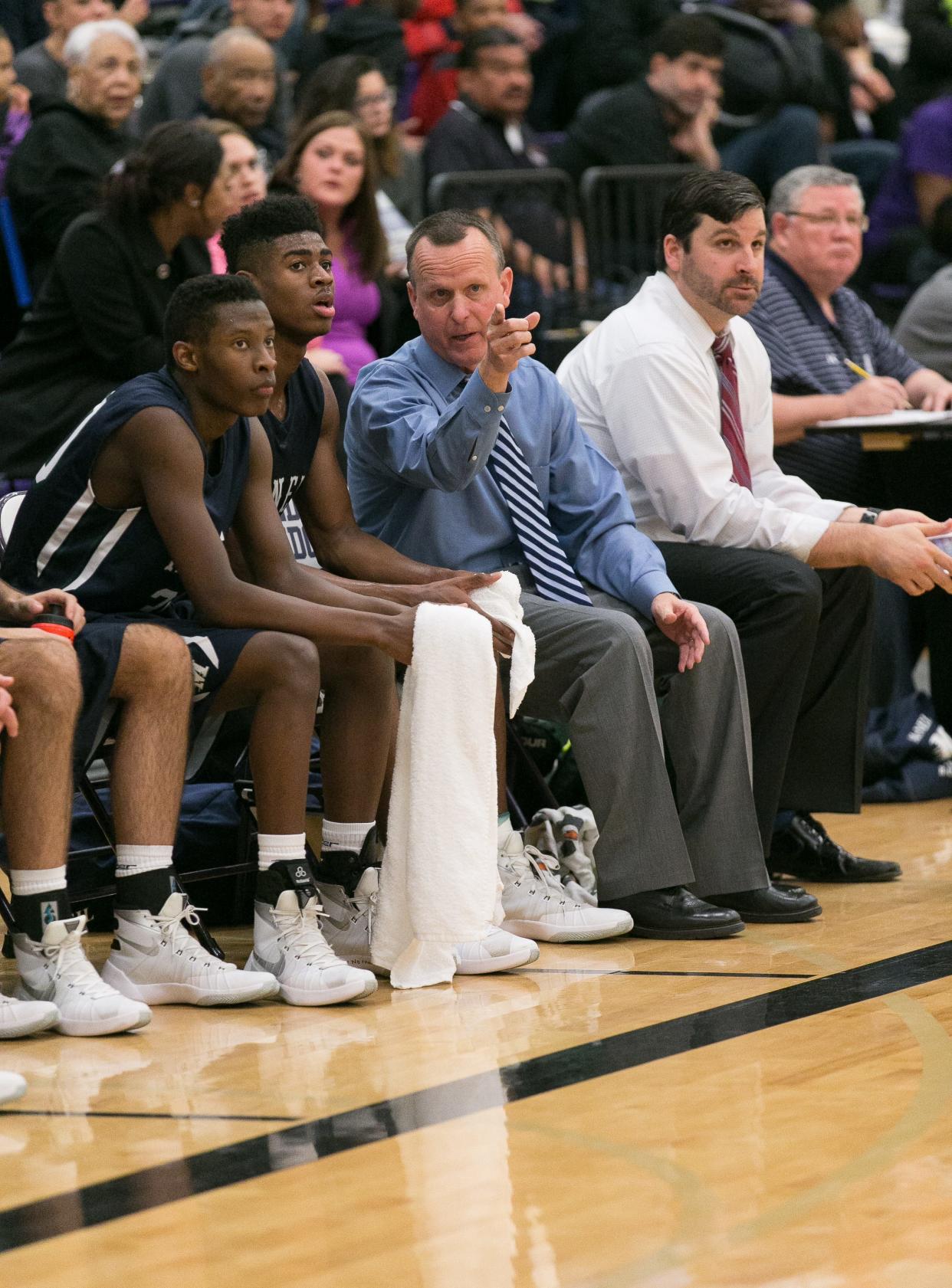 McNeil boys basketball coach Darrell Hagemann talks to Victor Bailey Jr. during a game against Cedar Ridge in 2016. Hagemann, the only coach in McNeil's 30-year history, will retire at the end of the school year after almost 600 wins and multiple district titles with the Mavs.