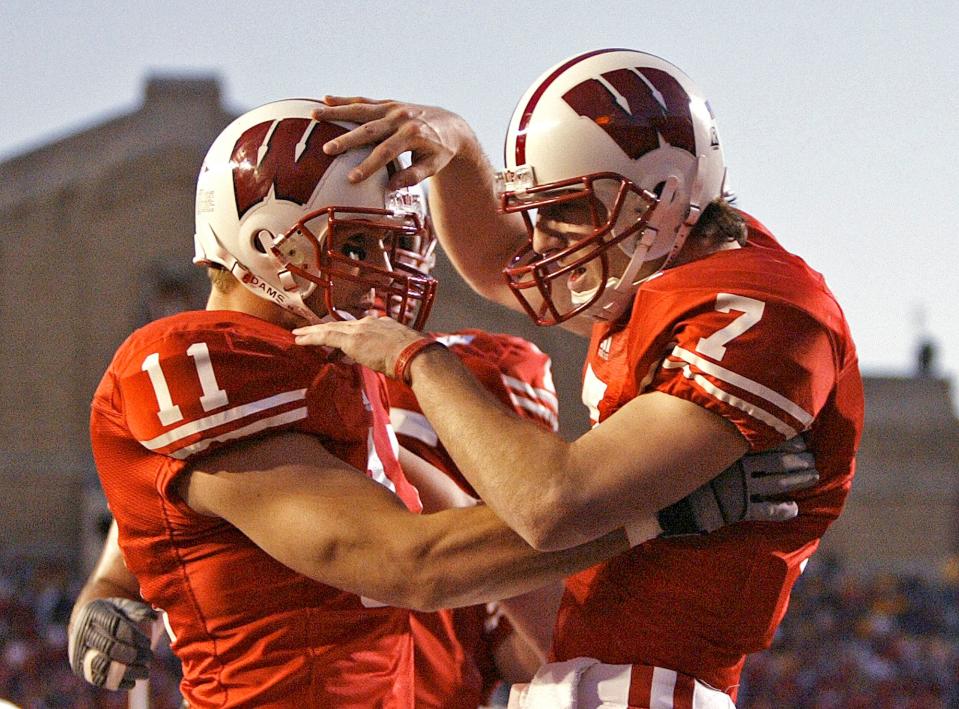 Wisconsin quarterback John Stocco (7) celebrates a second-half touchdown run with Owen Daniels on Nov. 6, 2004, in Madison. Wisconsin beat Minnesota, 38-14.