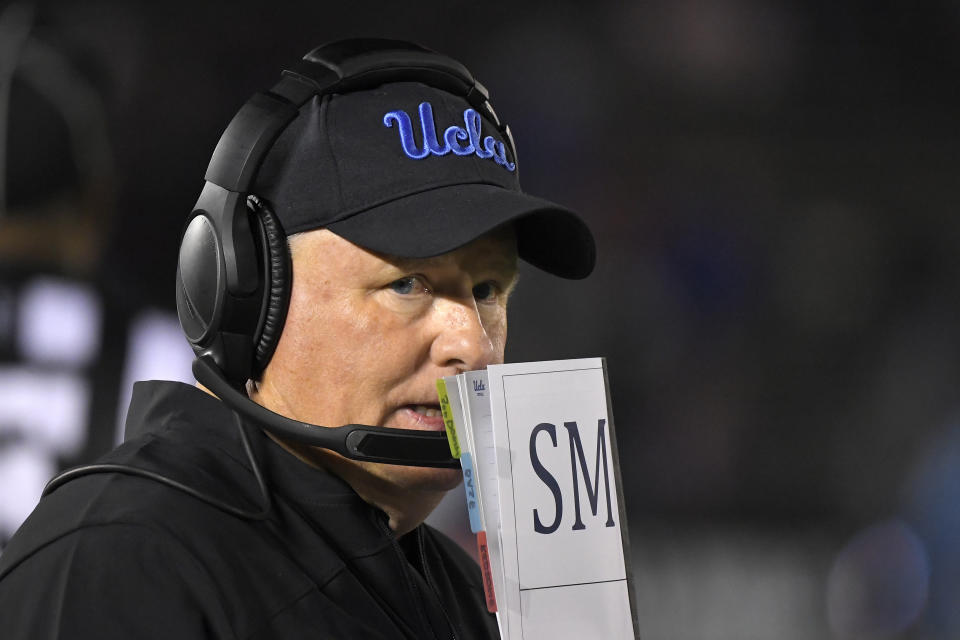 FILE - In this Nov. 30, 2019 file photo, UCLA head coach Chip Kelly stands on the sideline during the second half of an NCAA college football game against California in Pasadena, Calif. Kelly is entering his third year in charge but has only seven wins in his first two seasons. (AP Photo/Mark J. Terrill, File)