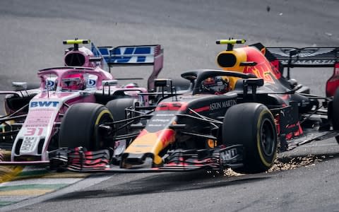 Ocon and Verstappen collide - Credit: Getty Images