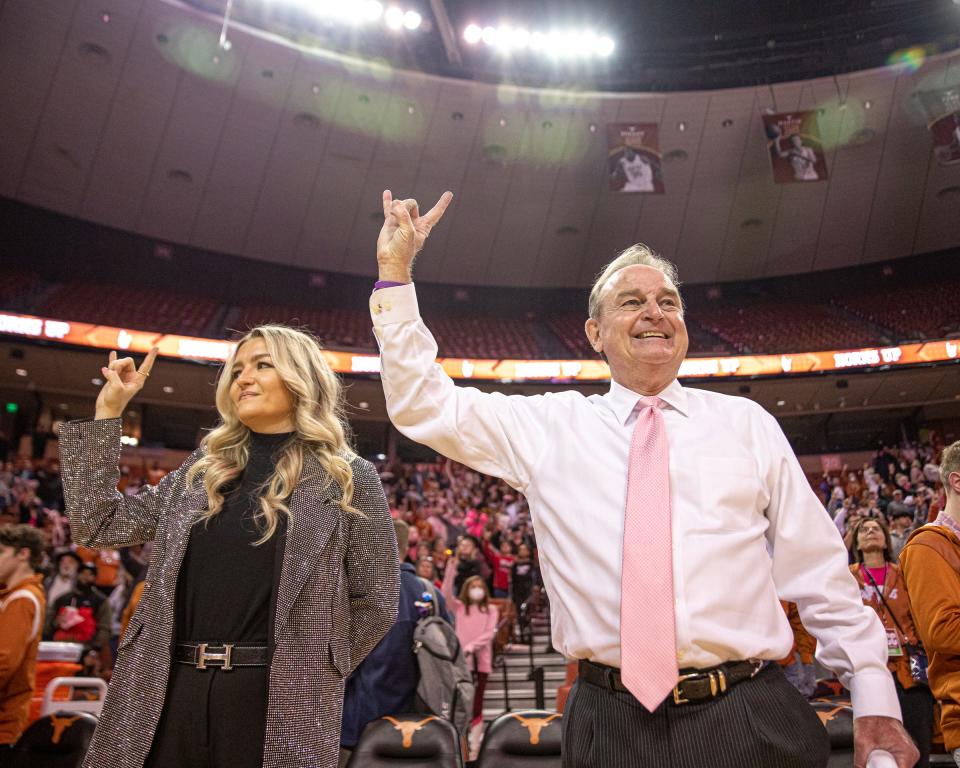 Texas assistant coach Blair Schaefer, left, thinks her father, head coach Vic Schaefer, has cooled off. Just a little bit. "I think he's still the same competitor," she said. "But sometimes the wall does hit him at times and he does have to just realize, you know what, this team has good fundamentals, they're going to play their butt off for him and he's gonna be prepared for whatever situation comes because that's what legends do."