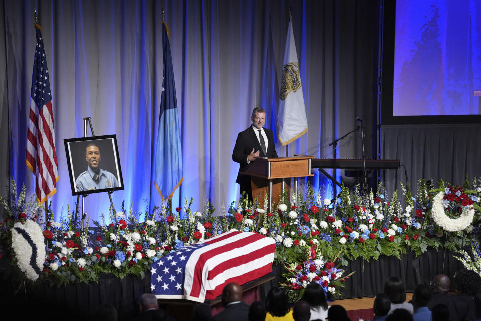 Pastor Mike Emmert speaks during a public memorial service for Minneapolis police Officer Jamal Mitchell at Maple Grove Senior High School, Tuesday, June 11, 2024, in Maple Grove, Minn. Mitchell was shot and killed while responding to a shooting on May 30, 2024. (AP Photo/Abbie Parr, Pool)