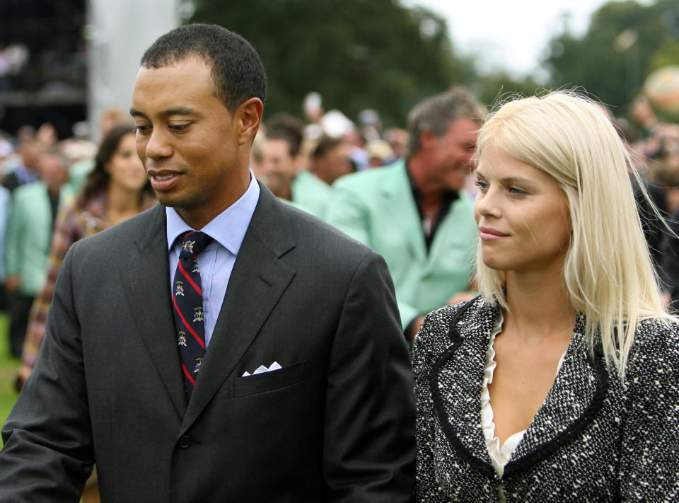 United States Ryder Cup team member Tiger Woods (L) and his partner Elin, leave after attending the opening ceremony of the 2006 Ryder Cup at the K Club in Straffan, Co Kildare, in the Republic of Ireland, 21 September 2006.&nbsp;(Photo by Adrian Dennis/AFP/Getty Images)