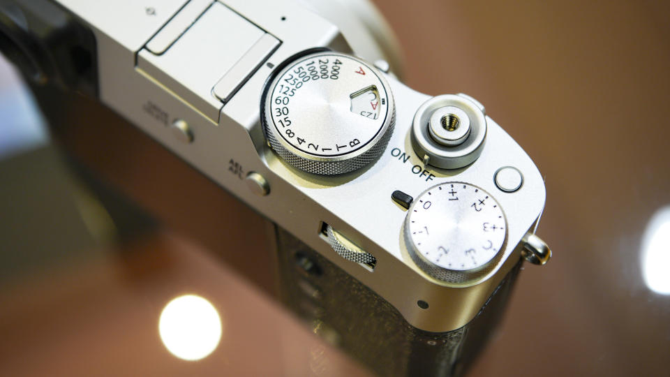 Closeup of the top plate controls of the Fujifilm X100VI