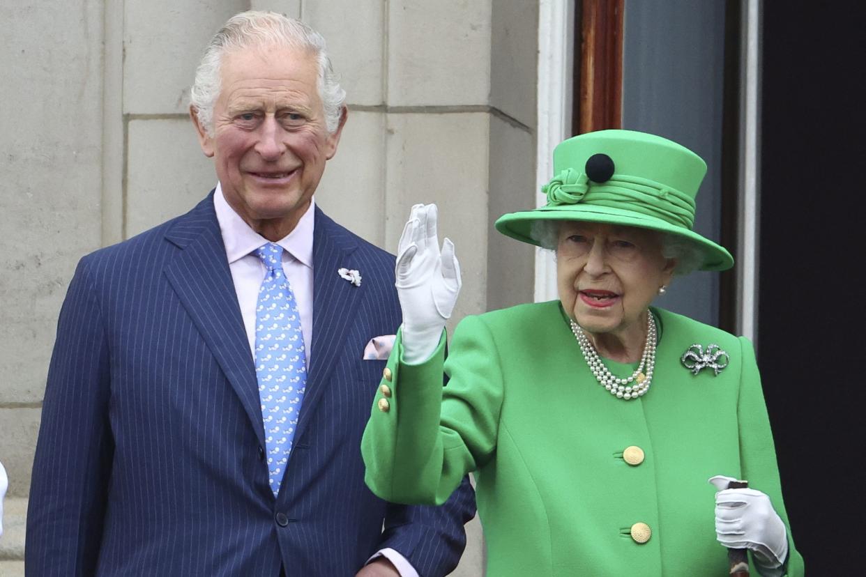 Britain's Prince Charles, and Queen Elizabeth II appear on the balcony of Buckingham Palace during the Platinum Jubilee Pageant outside Buckingham Palace in London June 5, 2022, on the last of four days of celebrations to mark the Platinum Jubilee. 