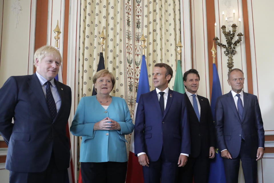 From the left, Britain's Prime Minister Boris Johnson, German Chancellor Angela Merkel, French President Emmanuel Macron, Italian Premier Giuseppe Conte and President of the European Council Donald Tusk pose during a G7 coordination meeting with the Group of Seven European members at the Hotel du Palais in Biarritz, southwestern France, Saturday, Aug.24, 2019. Efforts to salvage consensus among the G-7 rich democracies frayed Saturday in the face of U.S. President Donald Trump's unpredictable America-first approach even before the official start of the summit in southern France. (AP Photo/Markus Schreiber, Pool)