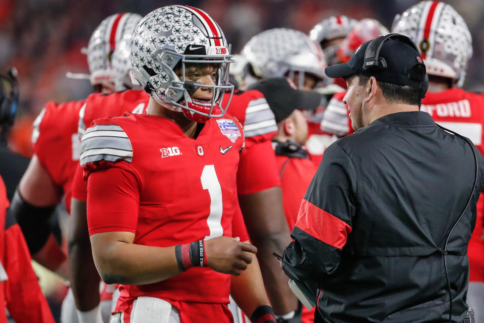 GLENDALE, AZ - DECEMBER 28:  Ohio State Buckeyes quarterback Justin Fields (1) talks with Ohio State Buckeyes head coach Ryan Day during the Fiesta Bowl college football playoff semi final game between the Clemson Tigers and the Ohio State Buckeyes on December 28, 2019 at State Farm Stadium in Glendale, Arizona. (Photo by Kevin Abele/Icon Sportswire via Getty Images)