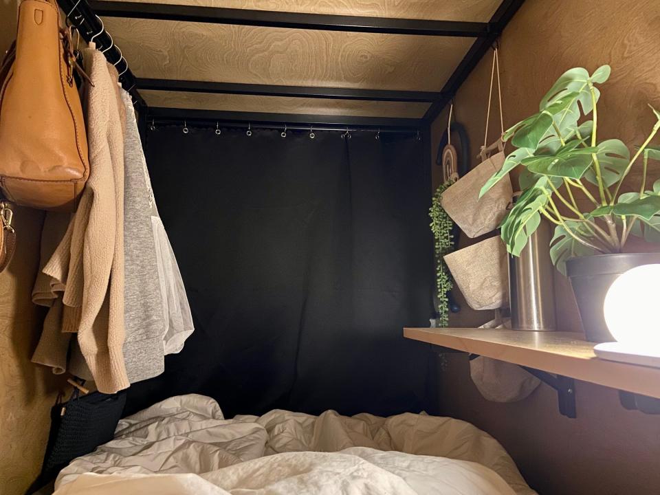 Inside a compact sleep pod in co-living house