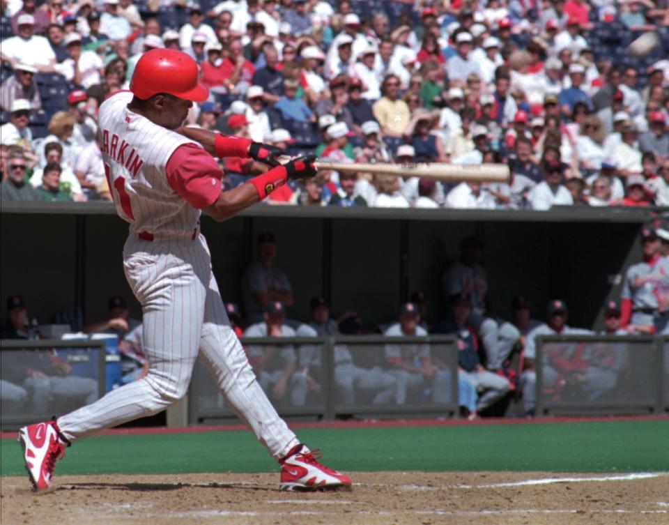 Cincinnati Reds' Barry Larkin hits his 30th home run of the season against the St. Louis Cardinals Sunday, Sept. 22, 1996, in Cincinnati. Larkin became the first shortstop in Major League history to hit at least 30 home runs and steal 30 bases in the same season. (AP Photo/Tom Uhlman)