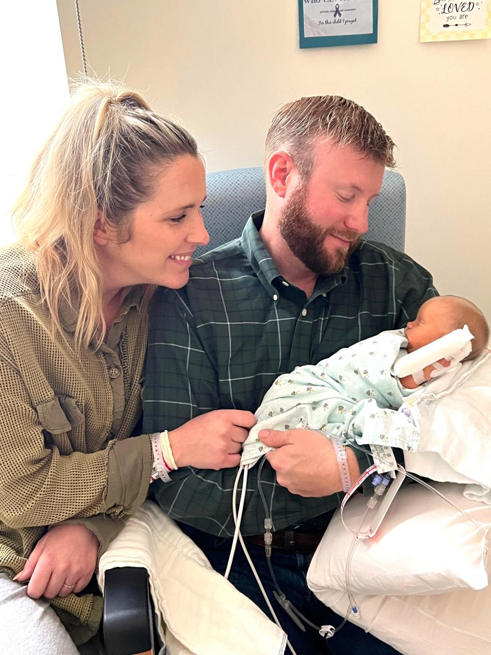Parents Katie and Jared Givens of Madisonville, Tennessee, happily hold their newborn son, Grady, who was born six weeks early with neonatal onset multisystem inflammatory disease, or NOMID.