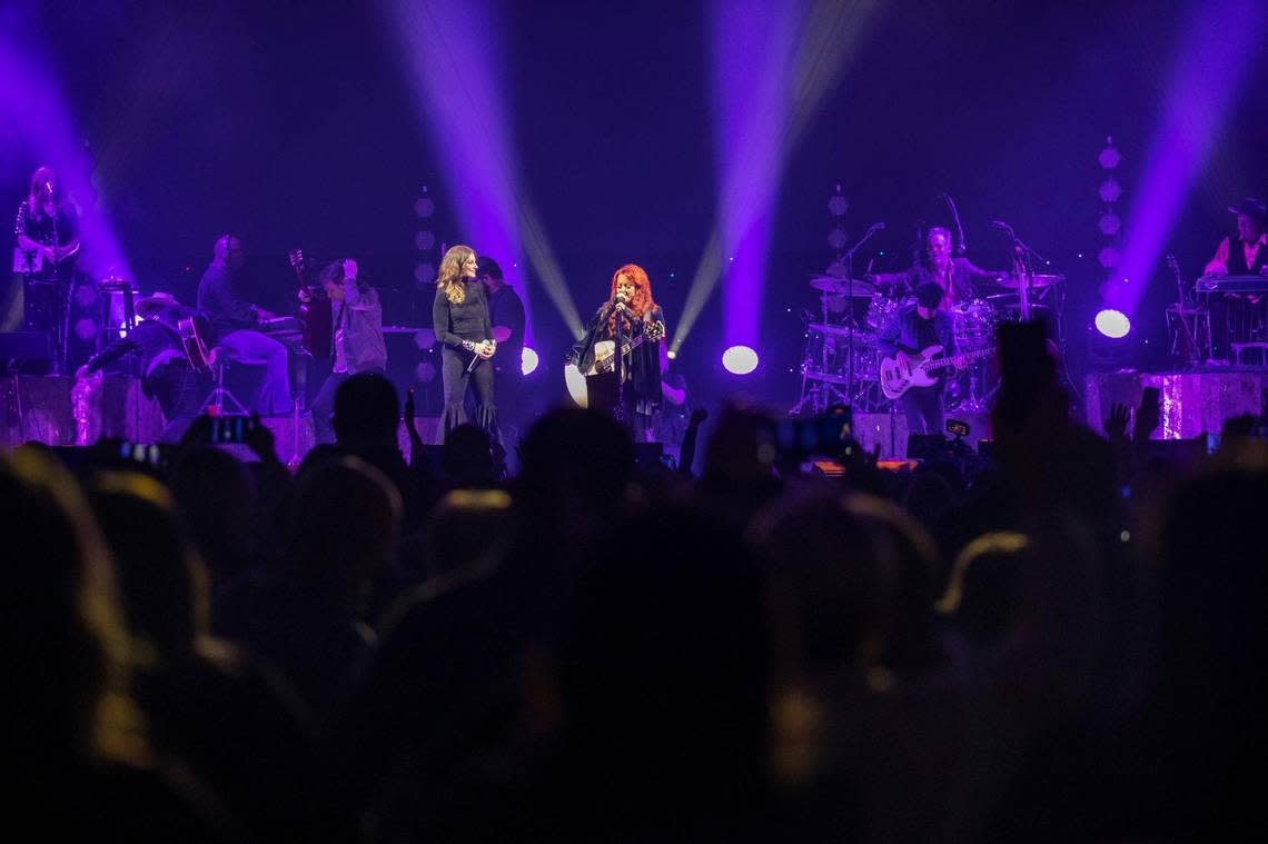 Faith Hill, left, and Wynonna Judd perform as The Judds: The Final Tour visits Rupp Arena in Lexington, Ky., on Saturday, Oct. 29, 2022.