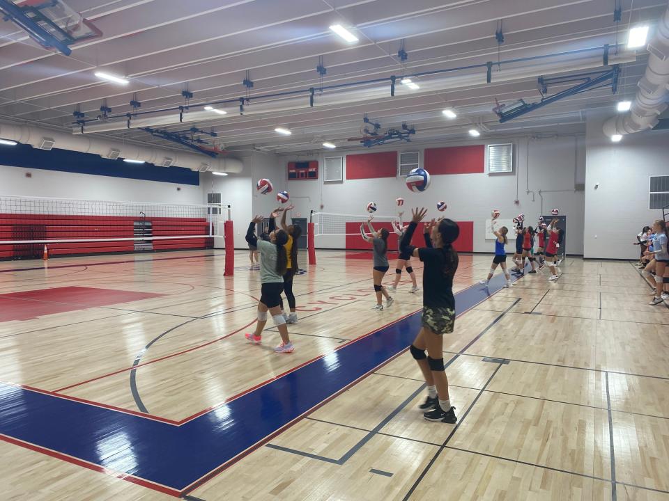 Jefferson Middle School girls practice volleyball in the new gym on Thursday.