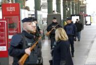 Police patrol the Gare du Nord train station the morning after a series of deadly attacks in Paris , November 14, 2015. REUTERS/Yves Herman