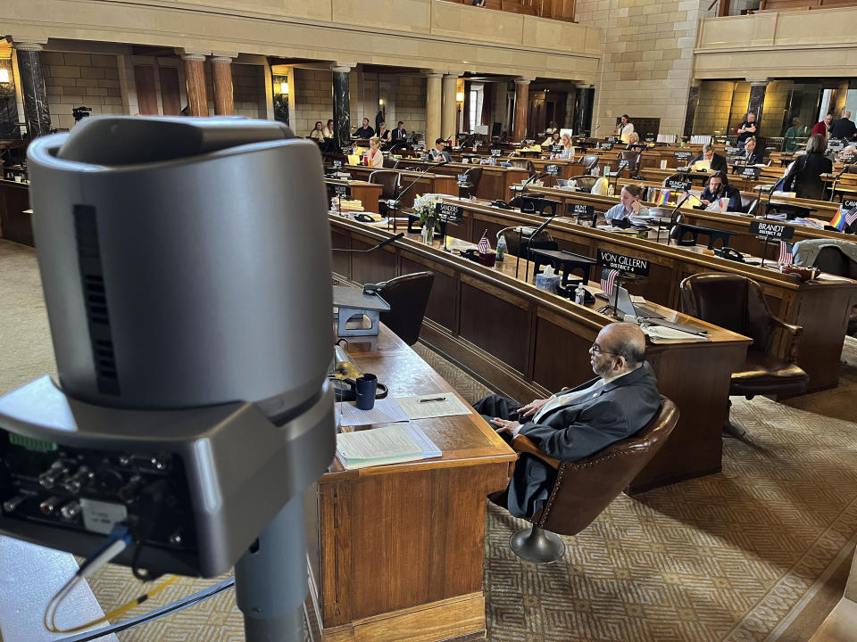 One of several cameras set up to capture live debate in the chamber of the Nebraska Legislature is shown, Wednesday, June 7, 2023, in Lincoln, Neb. State lawmakers say their emails and phone contacts this session revealed a growing number of people who watched the Nebraska Legislature's debates this year either on public television or on their computers, phones and tablets. Some even streamed the debate in their cars. (AP Photo/Margery Beck)