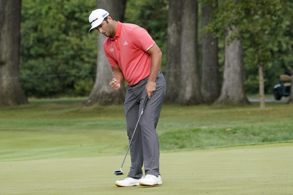 Jon Rahm reacts after making a birdie on the 15th hole during the final round of the BMW Championship golf tournament at the Olympia Fields Country Club in Olympia Fields, Ill., Sunday, Aug. 30, 2020. (AP Photo/Charles Rex Arbogast)