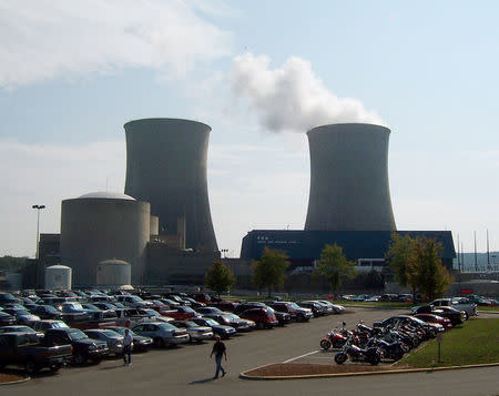 FILE PHOTO: Steam rises from a cooling tower at the Tennessee Valley Authority's Watts Bar Nuclear Plant in Spring City, 50 miles south of Knoxville, Tennessee, U.S. on September 7, 2007. REUTERS/Chris Baltimore/File Photo