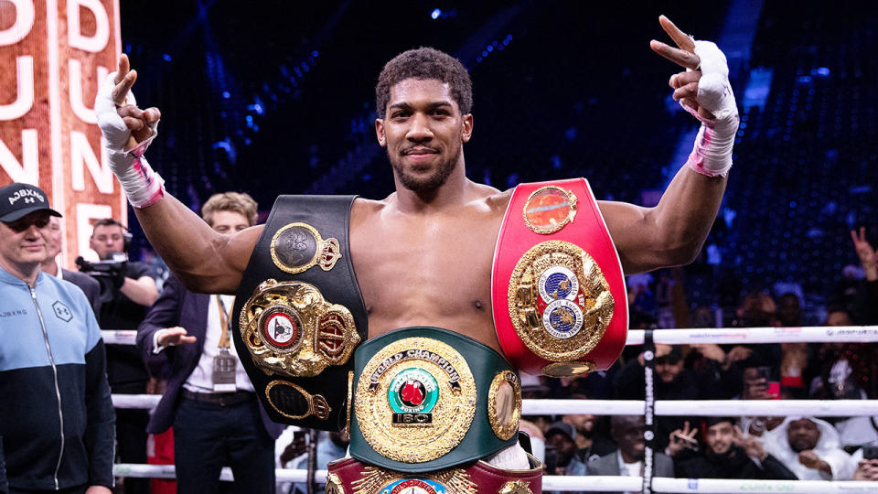 Pictured here, Anthony Joshua with the belts he regained in the Andy Ruiz Jr. rematch.