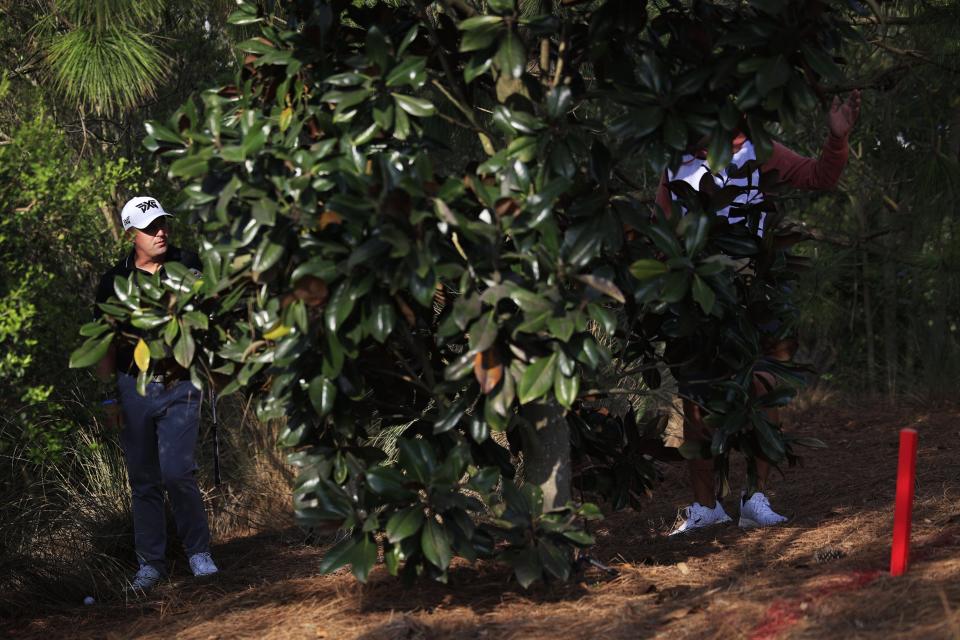 Justin Lower eyes his shot from the rough on No.  5 during the first round of The Players golf tournament play Thursday, March 9, 2023 at TPC Sawgrass in Ponte Vedra Beach, Fla.