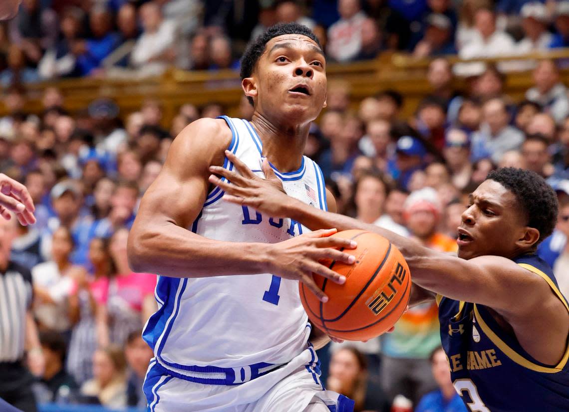 Duke’s Caleb Foster (1) drives to the basket past Notre Dame’s Markus Burton (3) during the first half of Duke’s game against Notre Dame at Cameron Indoor Stadium in Durham, N.C., Wednesday, Feb. 7, 2024.