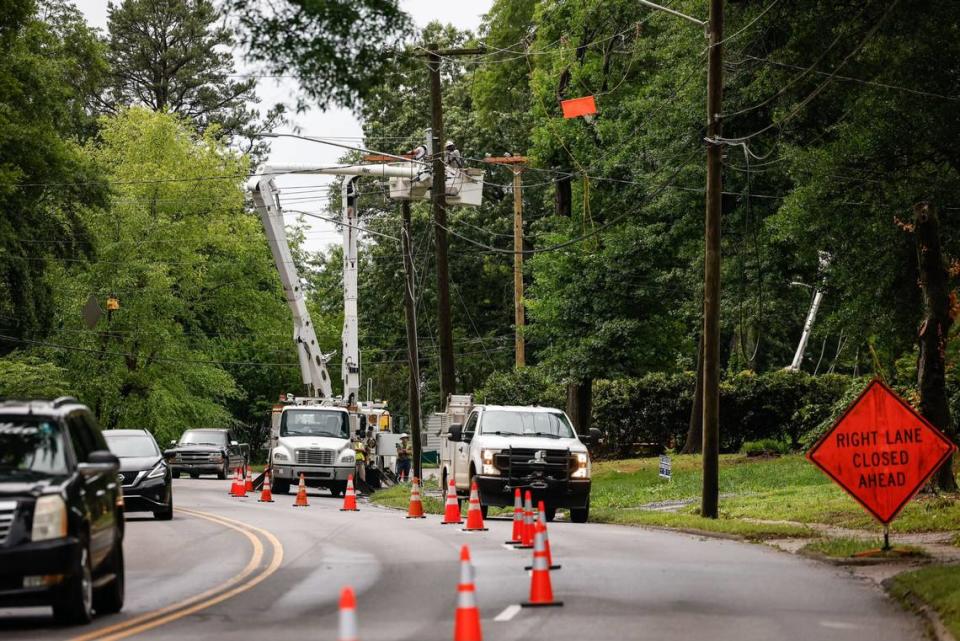 Workers tend to damages to power lines along South Chester Street caused by severe storms in Gastonia, N.C., on Thursday, May 9, 2024 Melissa Melvin-Rodriguez/mrodriguez@charlotteobserver.com