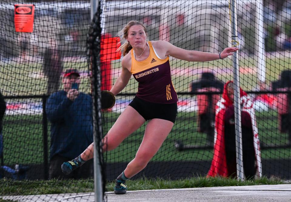 Bloomington North’s Hadley Lucas competes in the discus during the track meet at Owen Valley on Thursday, March 28, 2024.