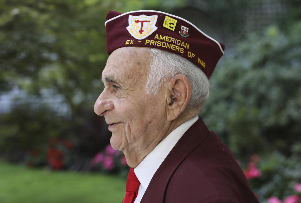 Harold Radish, 95, of the 90th division and a prisoner of war, poses during an interview with the Associated Press Friday, Aug.23, 2019 in Paris. Radish arrived in Normandy a few months after D-Day, fought into Germany, and then was captured and held as a prisoner of war. As a Jew, he remains surprised and grateful to have made it out alive. Radish was part of a group of World War II veterans taking part in commemorations of the 75th anniversary of the Allied operation to liberate Paris from Nazi occupation. (AP Photo/Daniel Cole)