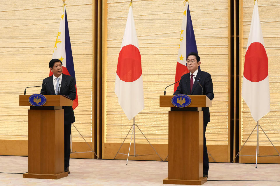 Philippine President Ferdinand Marcos Jr., left, and Japanese Prime Minister Fumio Kishida hold their joint press remarks after their talks at prime minister's official residence in Tokyo, Thursday, Feb. 9, 2023. (Kimimasa Mayama/Pool Photo via AP)