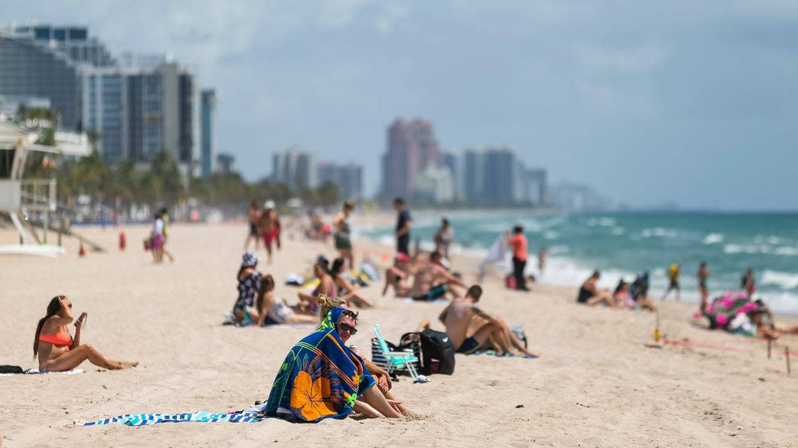 Beachgoers sunbathe at Las Olas Beach in Fort Lauderdale, Florida on Saturday, May 30, 2020. MATIAS J. OCNER/mocner@miamiherald.com