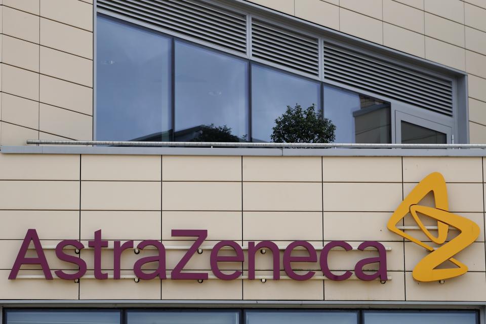FILE - In this Saturday, July 18, 2020 file photo a general view of AstraZeneca offices and the corporate logo in Cambridge, England. The European Medicines Agency is expected on Friday Jan. 29, 2021 to authorize use of the vaccine AstraZeneca developed with Oxford University. It would be the third cleared for use in the EU, after the BioNTech-Pfizer and Moderna vaccines. (AP Photo/Alastair Grant, File)