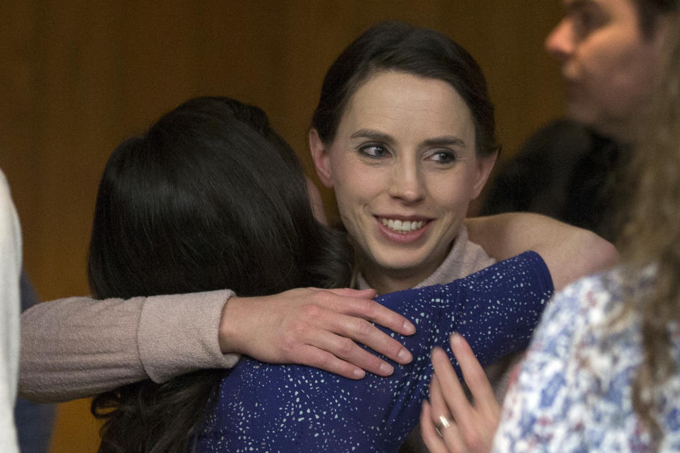 Rachael Denhollander hugs Larissa Boyce at the conclusion of Larry Nassar's sentencing. (Photo: RENA LAVERTY via Getty Images)