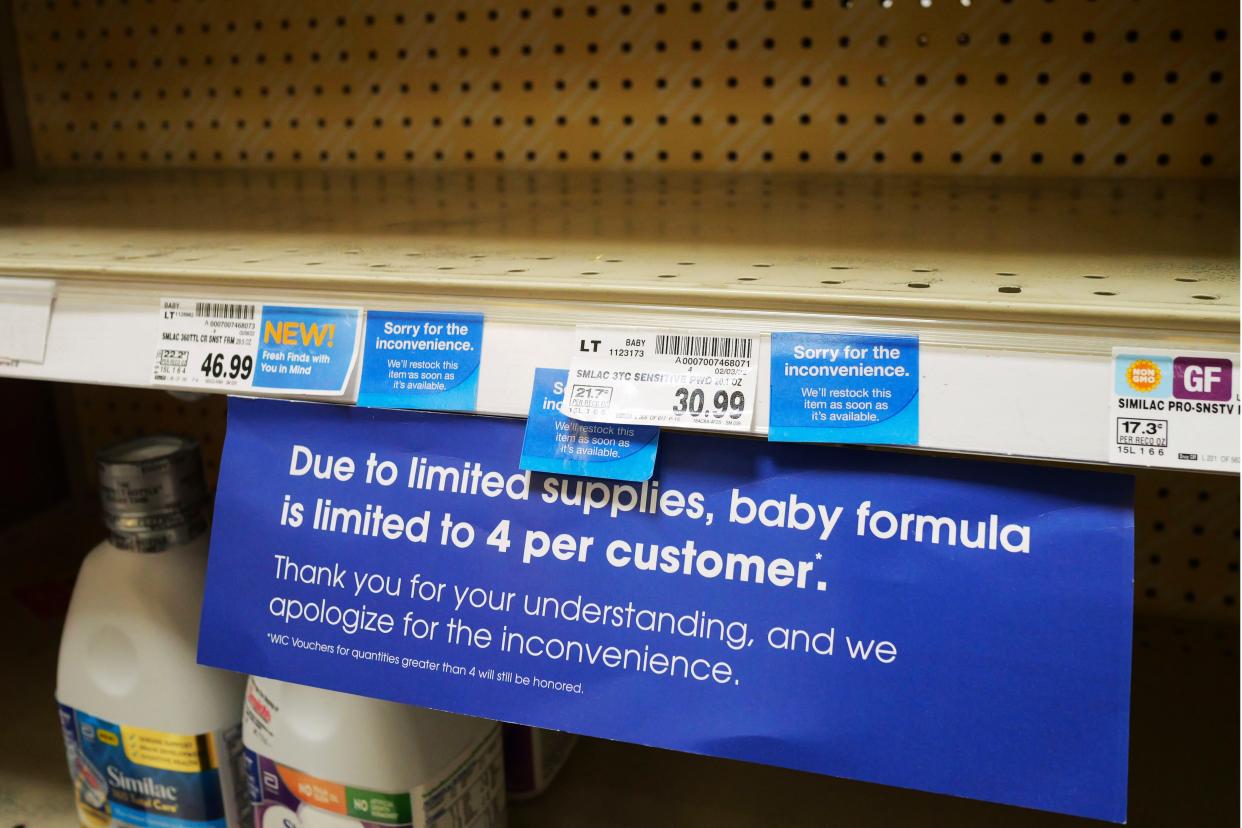 A "due to limited supplies" sign is shown on the baby formula shelf at a grocery store in Salt Lake City, Utah on Tuesday, May 10, 2022.