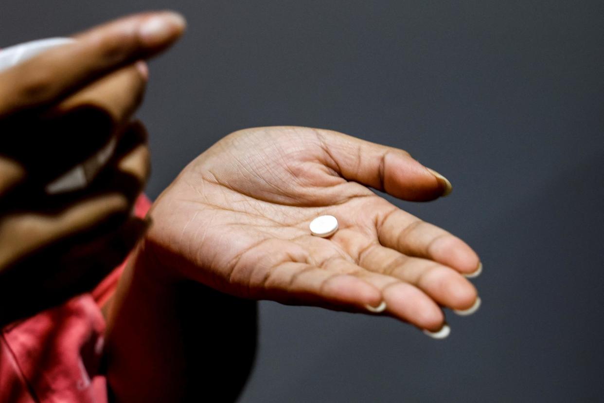 <span>A patient prepares to take mifepristone at a clinic in Carbondale, Illinois, on 20 April 2023.</span><span>Photograph: Evelyn Hockstein/Reuters</span>