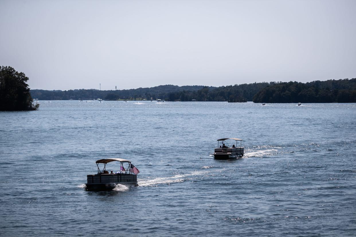 Boats cruise through Lake Keowee on Labor Day, Monday, September 7, 2020.