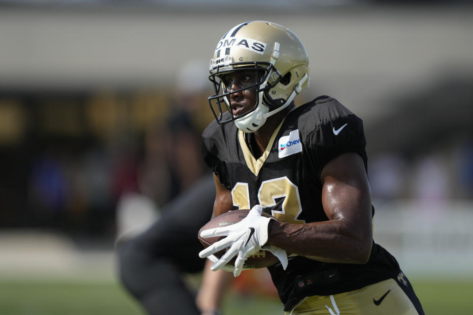 New Orleans Saints wide receiver Michael Thomas runs through drills at the NFL team's football training camp in Metairie, La., Tuesday, Aug. 1, 2023. (AP Photo/Gerald Herbert)