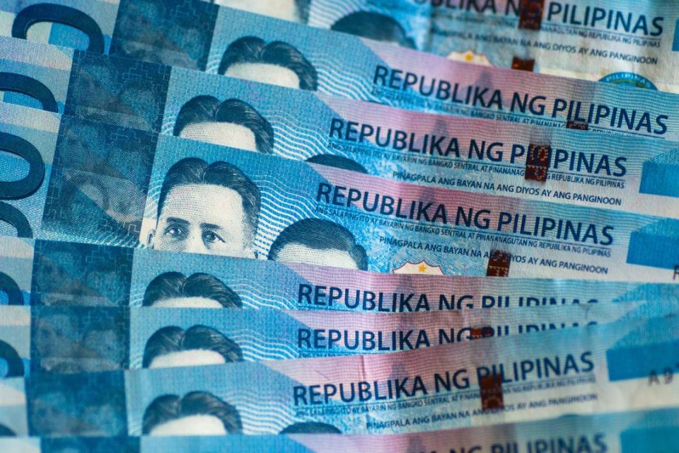 Philippine one thousand-peso banknotes are arranged for a photograph in Manila, the Philippines. (Photo: Getty Images)