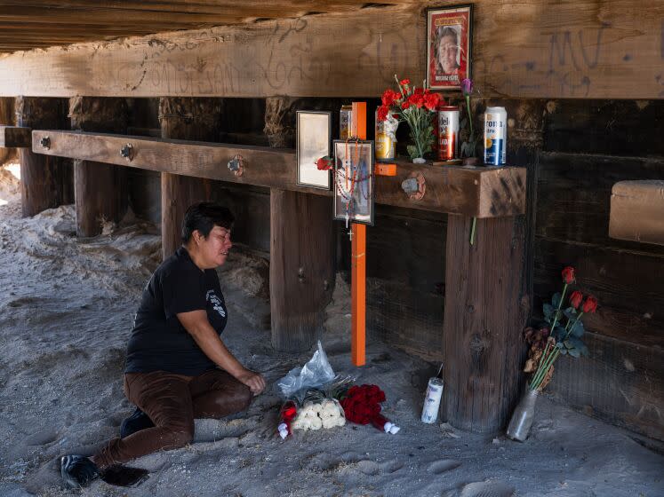 Reyna Cervantes collapses in grief at the site in Ocotillo, California, where her husband, Jose Cervantes Arista, died under a bridge while trying to cross from Mexico into the US in July, 2020, during a visit to the site to commemorate the third anniversary of his death. Saturday, July 8, 2023. Andrew Cullen