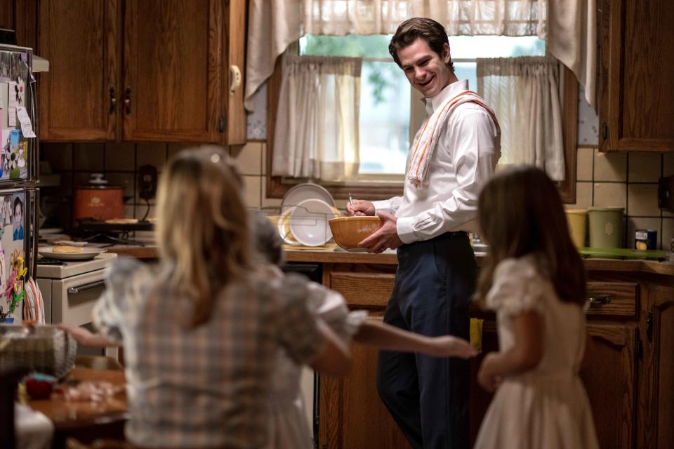 Devout Mormon Jeb Pyre (Andrew Garfield), a father of two, begins to question his faith as his investigation continues. "He starts to get very panicked at the idea of his daughters being brainwashed into a patriarchal kind of system," says Garfield.