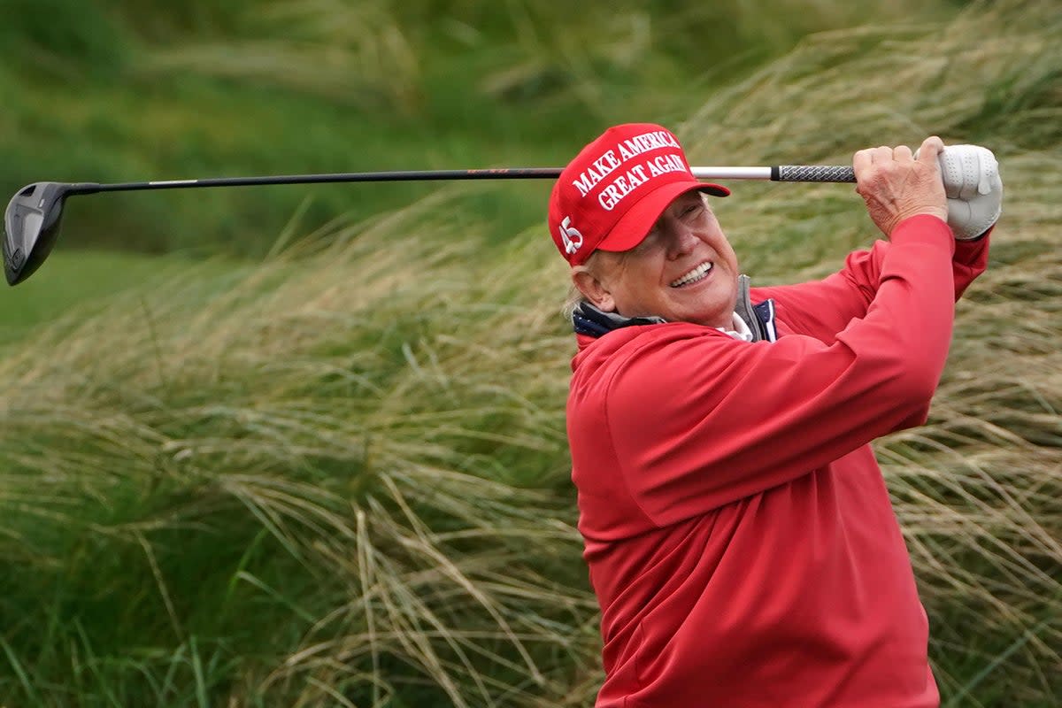 Former US president Donald Trump playing golf at Trump International Golf Links & Hotel in Doonbeg, Co Clare, during his visit to Ireland (PA Wire)